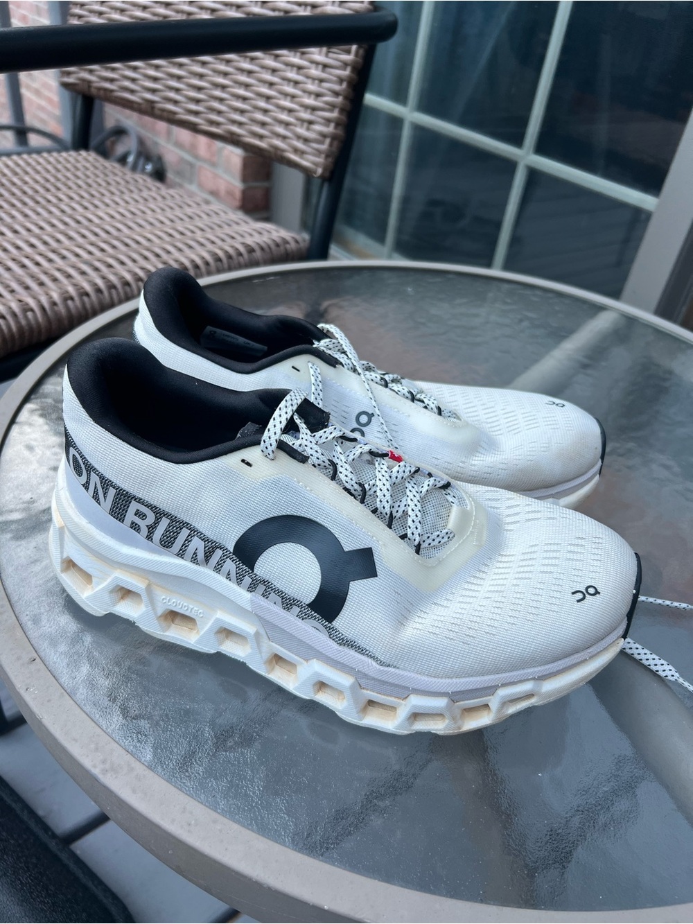 On Running White and Black Women’s Athletic Running Shoes